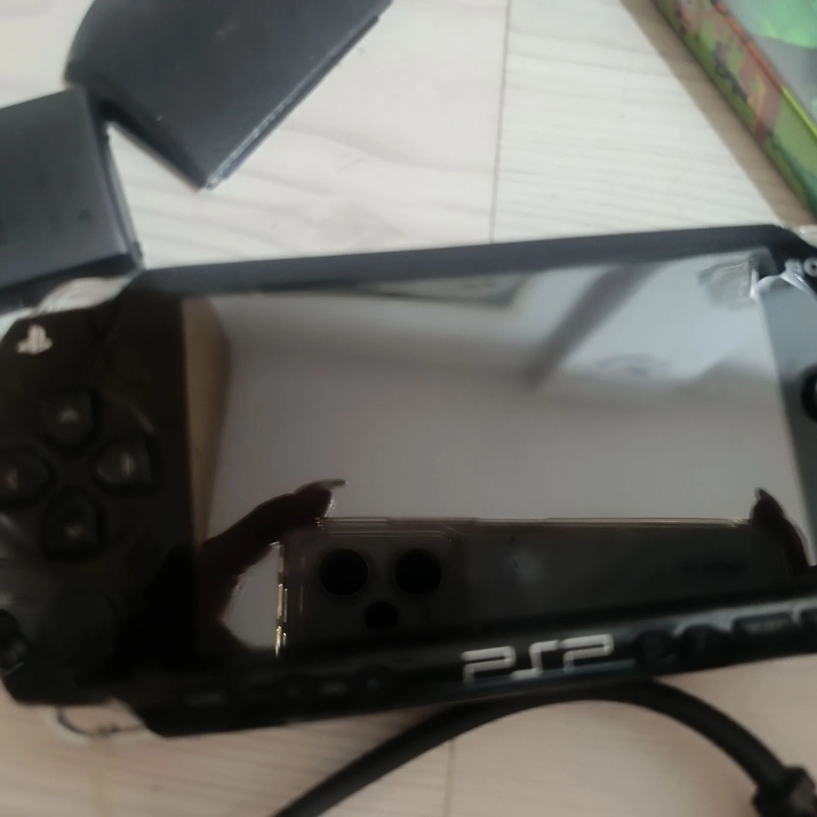 Pack Sony PSP + étui rigide + chargeur d'origine + carte 2 Go + 5 jeux – photo 7